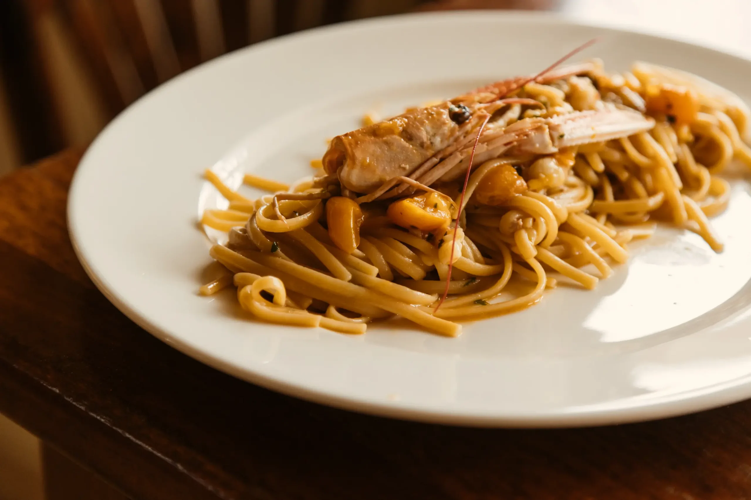 Bella Napoli's elegant dining room with wood-fired pizza oven